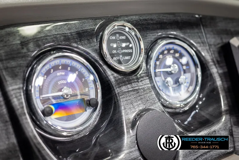 Slide: The Image of Dashboard of 2025 Avalon LSZ VRB with gauges and controls, featuring Reeder-Trausch Marine branding. - 35