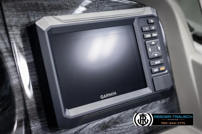 Slide: The Image of Garmin display in 2025 Avalon LSZ VRB boat dashboard, Reeder-Trausch Marine branding visible. - 36