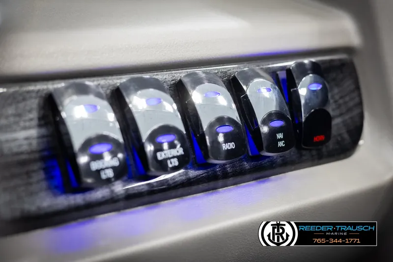 Slide: The Image of Control panel of 2025 Avalon LSZ VRB with illuminated switches and branding. - 37
