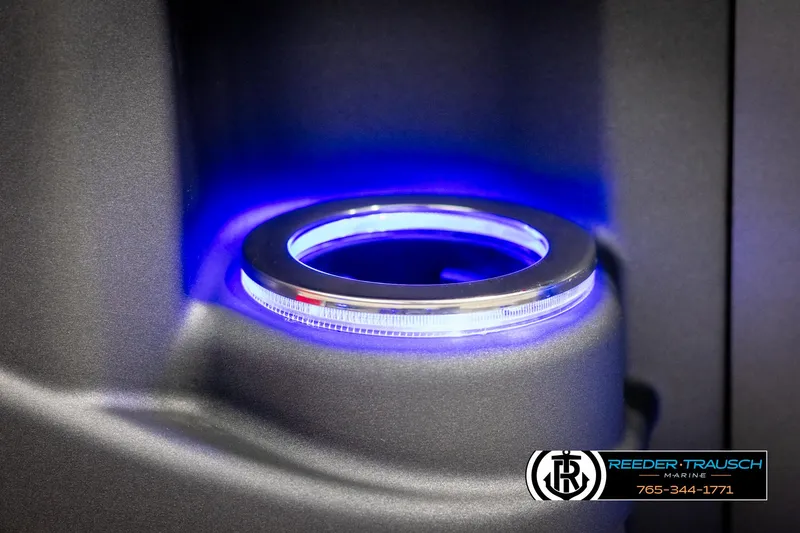 Slide: The Image of Illuminated cup holder in 2025 Avalon LSZ VRB boat, featuring blue LED lighting. - 42