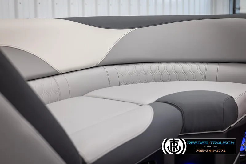 Slide: The Image of Luxurious seating in 2025 Avalon LSZ VRB boat, featuring elegant gray and white upholstery. - 43