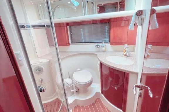 Slide: The Image of Luxurious bathroom in 2006 Fairline 50 yacht with modern fixtures and elegant design. - 14