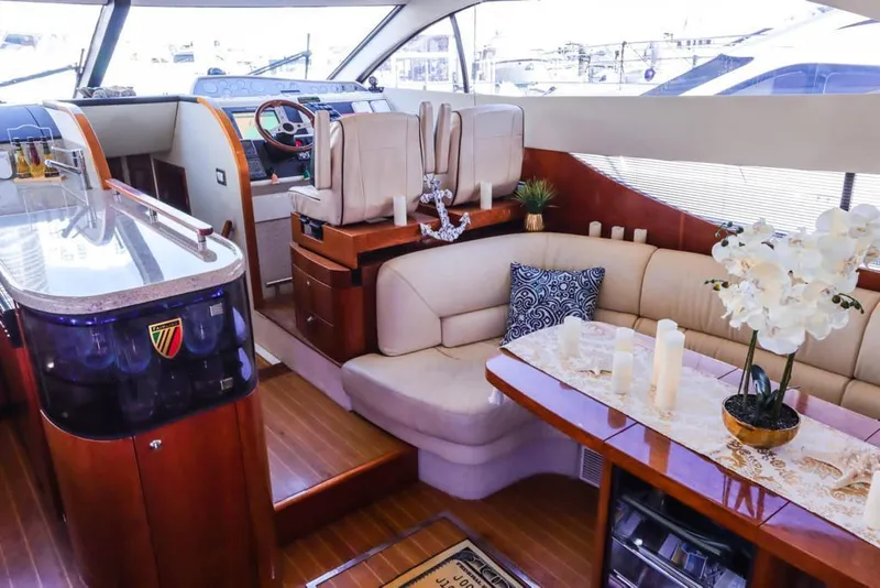 Slide: The Image of Luxurious 2006 Fairline 50 yacht interior with elegant seating and modern decor. - 8