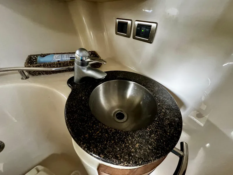 Slide: The Image of Stainless steel sink in 2007 Sea Ray 40 Sundancer yacht bathroom. - 14