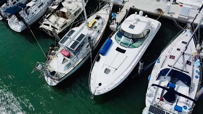 Slide: The Image of Aerial view of 2007 Sea Ray 40 Sundancer docked among sailboats. - 2