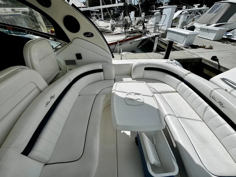 Slide: The Image of Luxurious seating area on a 2007 Sea Ray 40 Sundancer yacht at a marina. - 42