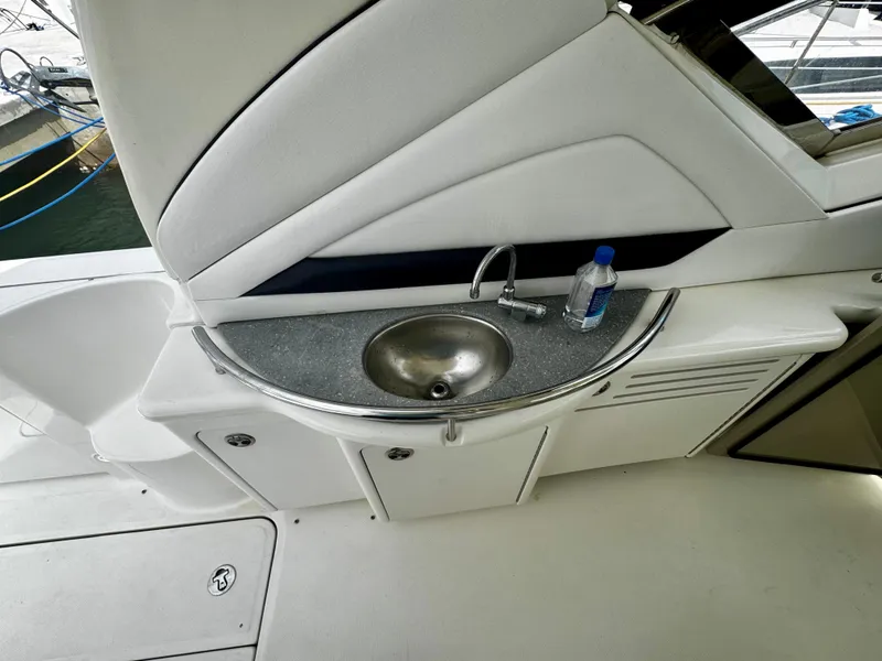 Slide: The Image of 2007 Sea Ray 40 Sundancer yacht sink area with countertop and faucet. - 45