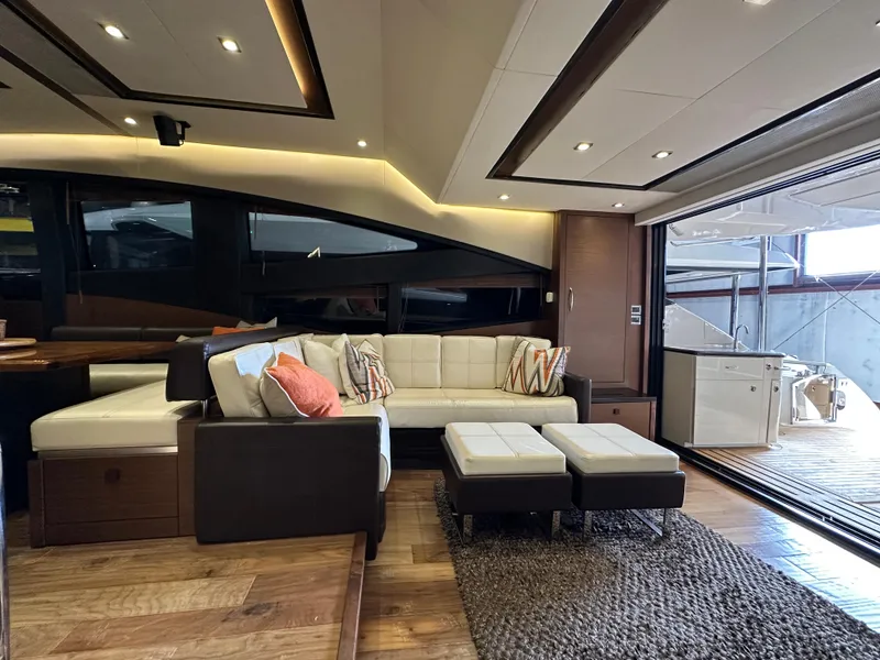 Slide: The Image of Luxurious interior of 2015 Sea Ray L650 Fly yacht with modern seating and elegant design. - 26