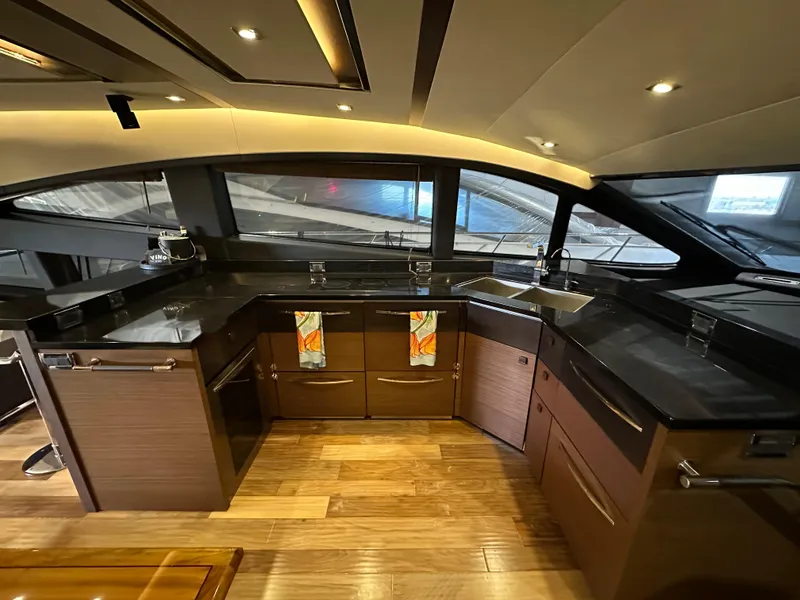 Slide: The Image of Luxurious kitchen interior of 2015 Sea Ray L650 Fly yacht with modern design. - 31
