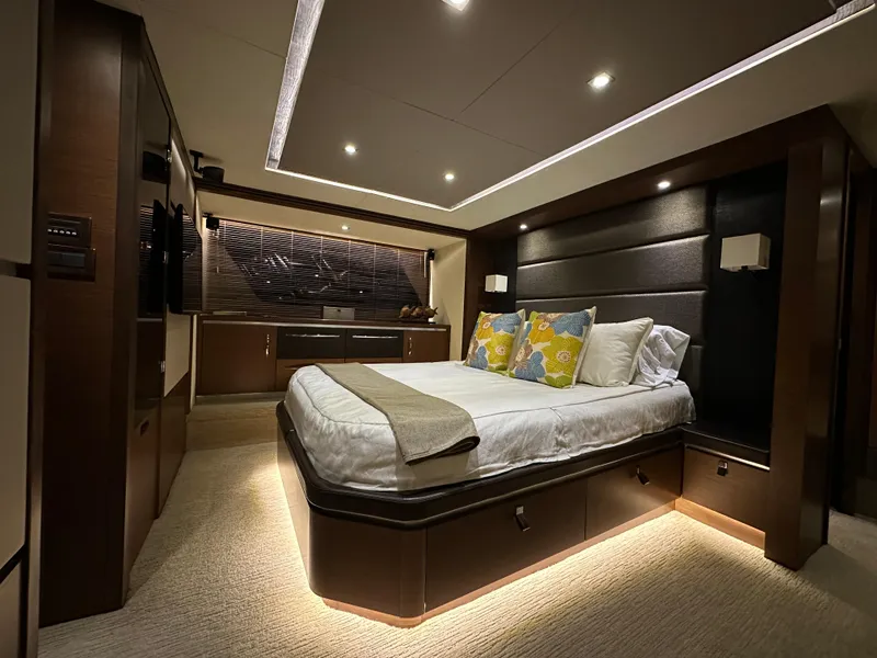 Slide: The Image of Luxurious bedroom interior of 2015 Sea Ray L650 Fly yacht with modern lighting and decor. - 46