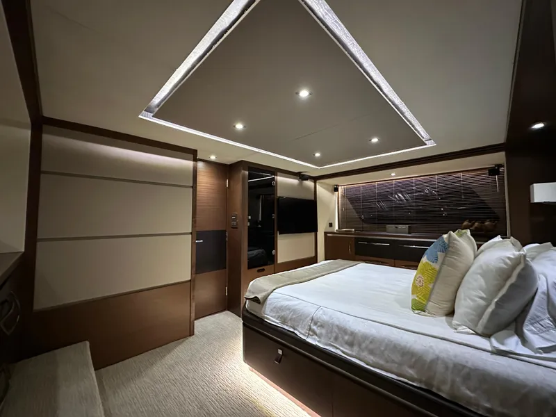 Slide: The Image of Luxurious bedroom interior of 2015 Sea Ray L650 Fly yacht with modern design and ambient lighting. - 48