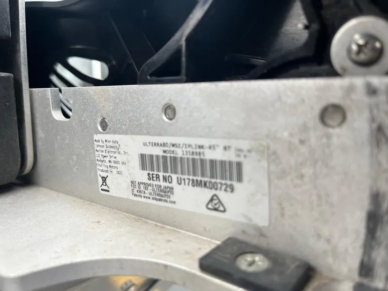 Slide: The Image of Close-up of a 2011 Lowe FM 165 model serial number plate. - 25