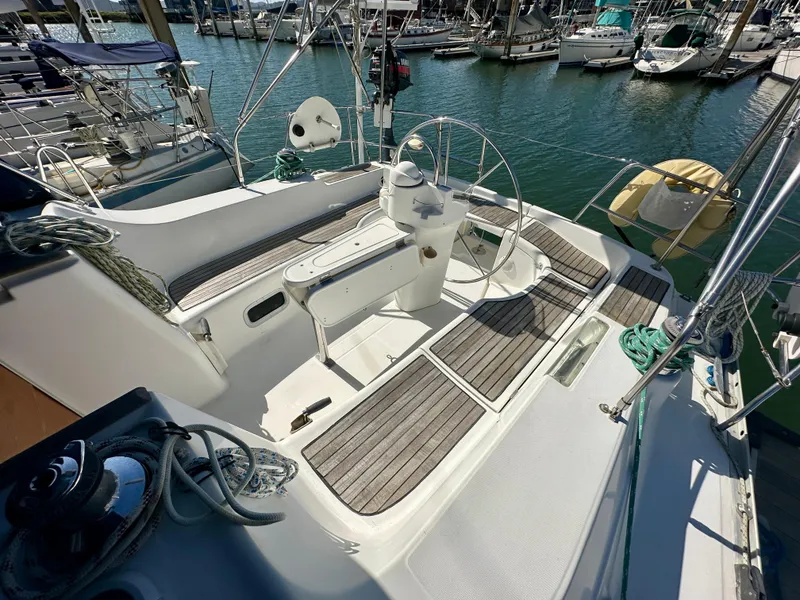 Slide: The Image of Cockpit of 2002 Beneteau Oceanis Clipper 393 sailboat docked at marina. - 14