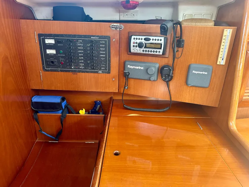 Slide: The Image of Control panel of 2002 Beneteau Oceanis Clipper 393 yacht with navigation equipment. - 26