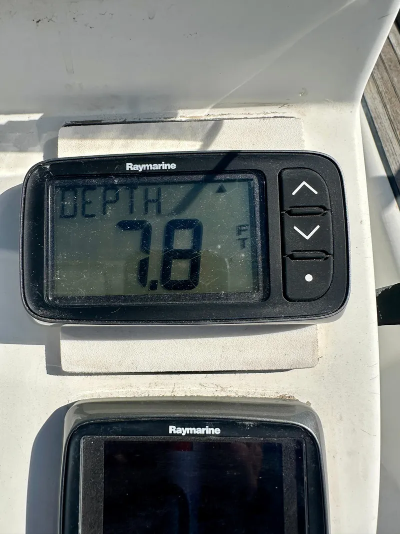 Slide: The Image of Raymarine depth gauge displaying 7.8 feet on a 2002 Beneteau Oceanis Clipper 393. - 39