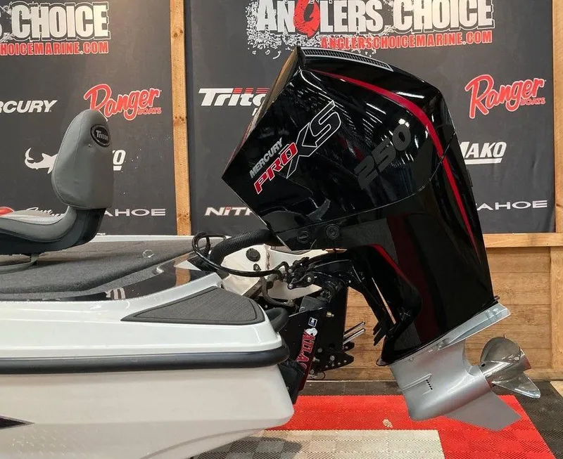 Slide: The Image of 2025 Triton 20XP boat with Mercury Pro XS 250 engine, showcased at Angler's Choice. - 4