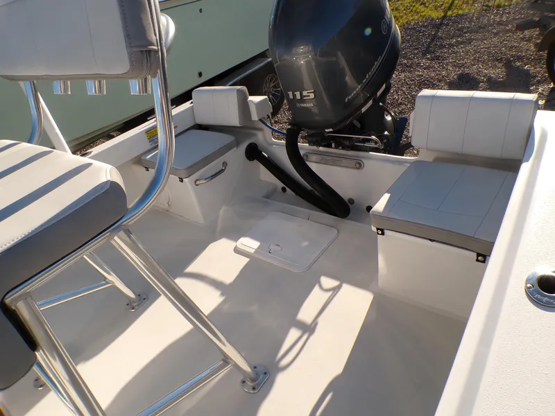 Slide: The Image of 2024 Parker 1801 Center Console boat interior with seating and Yamaha 115 engine. - 10