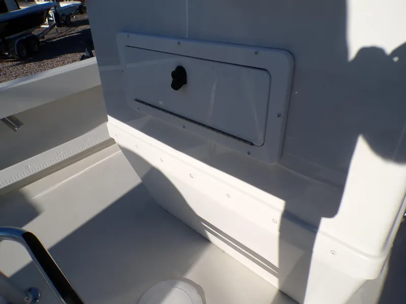 Slide: The Image of 2024 Parker 1801 Center Console boat interior with storage compartment. - 18