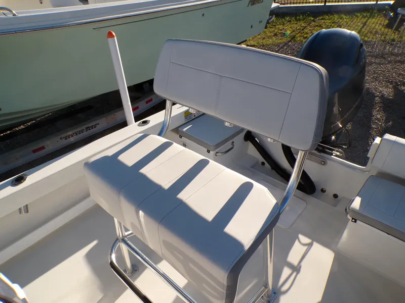 Slide: The Image of 2024 Parker 1801 Center Console boat interior with cushioned seating and sleek design. - 19