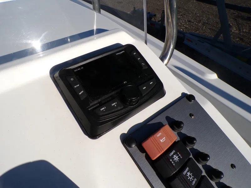 Slide: The Image of 2024 Parker 1801 Center Console dashboard with control panel and display. - 22