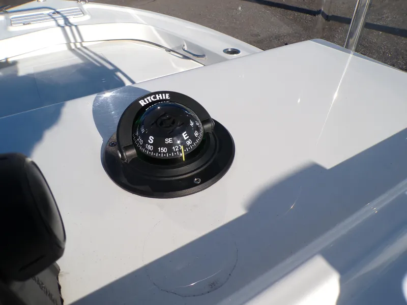 Slide: The Image of Compass on 2024 Parker 1801 Center Console boat dashboard in sunlight. - 23