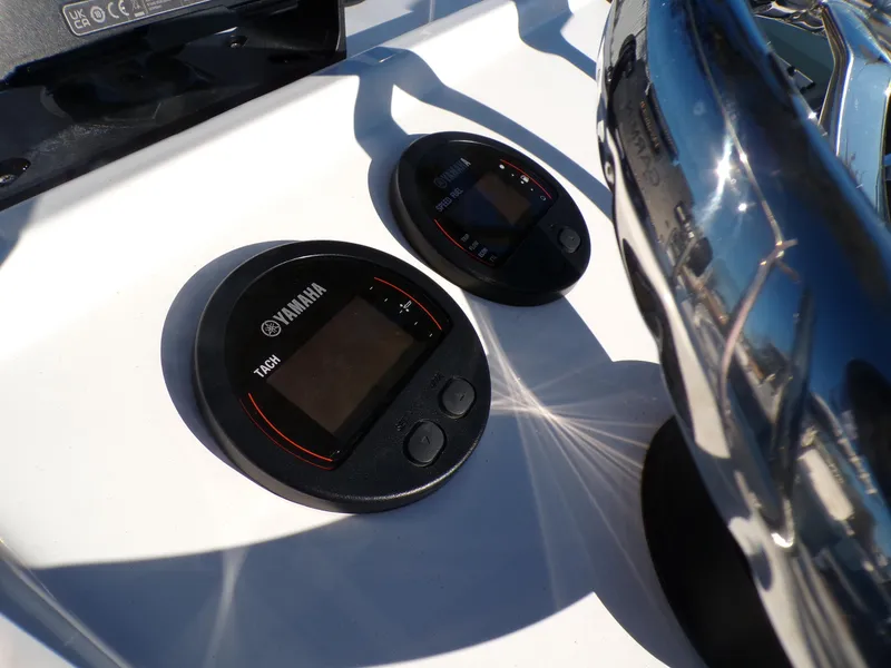 Slide: The Image of 2024 Parker 1801 Center Console dashboard with Yamaha tachometer displays. - 24