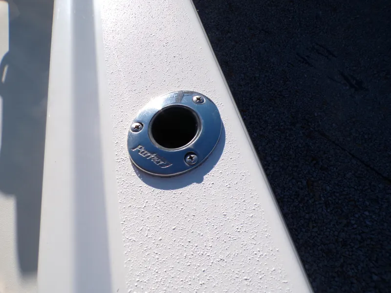 Slide: The Image of Close-up of a 2024 Parker 1801 Center Console boat's rod holder. - 32