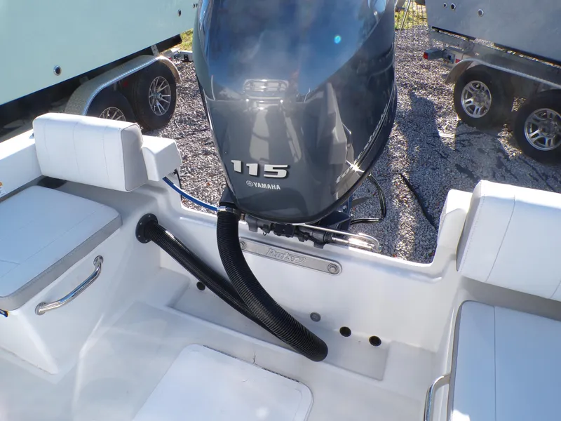 Slide: The Image of 2024 Parker 1801 Center Console boat with Yamaha 115 engine, rear seating view. - 33