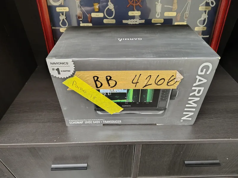 Slide: The Image of Garmin Echomap UHD2 54SV box on shelf, labeled "BB 4266" for Parker 1801 Center Console 2024. - 41