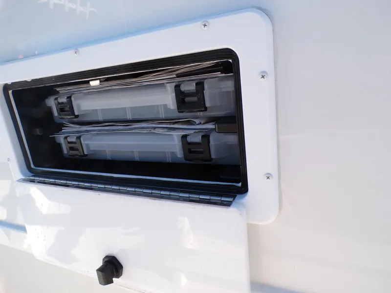 Slide: The Image of Storage compartment on a 2024 Parker 1801 Center Console boat. - 9