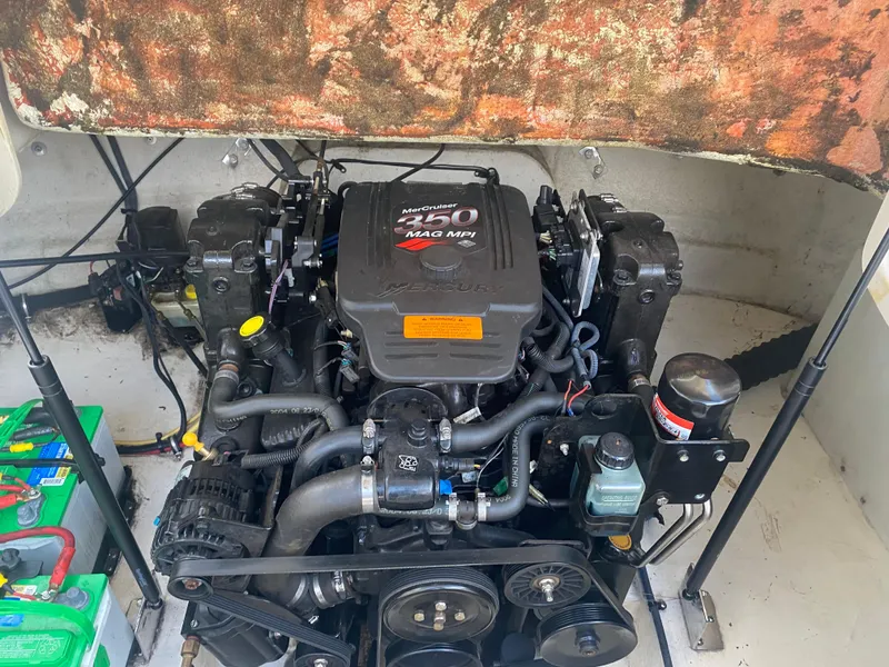 Slide: The Image of 2005 Chaparral Sunesta 254 engine compartment with MerCruiser 350 MAG MPI engine. - 24