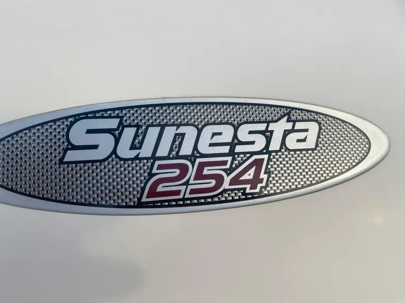 Slide: The Image of 2005 Chaparral Sunesta 254 logo on textured background. - 31