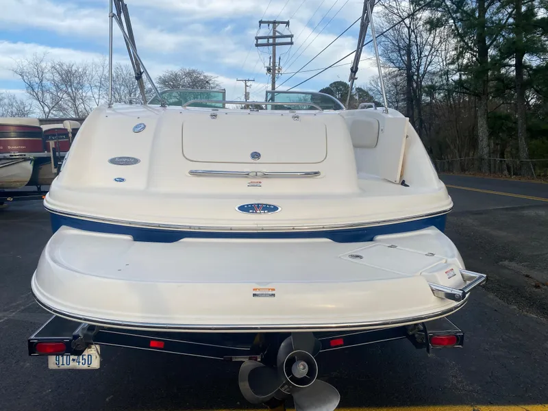 Slide: The Image of 2005 Chaparral Sunesta 254 boat, rear view, parked outdoors. - 34