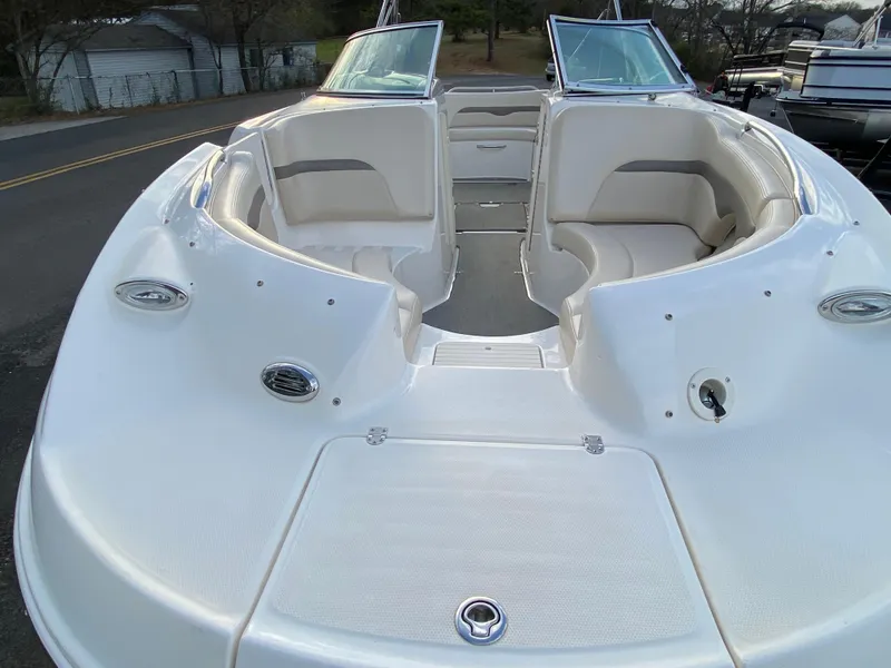 Slide: The Image of 2005 Chaparral Sunesta 254 boat with spacious seating and sleek design. - 6