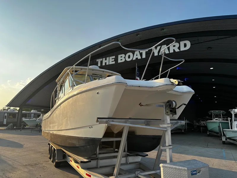 Slide: The Image of 2005 World Cat 320EC boat on trailer at The Boat Yard. - 3