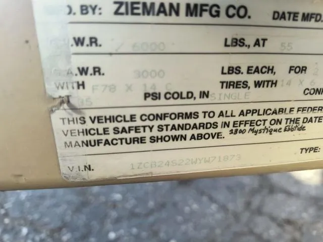 Slide: The Image of Label on 1998 Ebbtide 2300 Mystique Deck Boat, showing vehicle safety standards and specifications. - 26