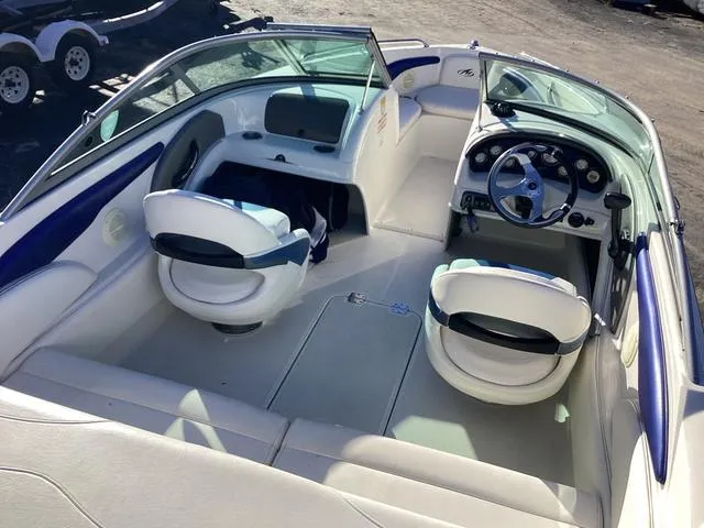 Slide: The Image of 2012 Monterey Sport Boat 184FS interior with dual seats and steering console. - 16