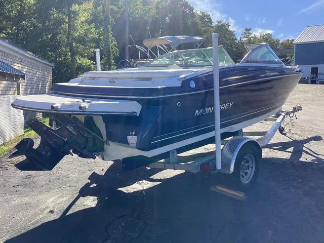 Slide: The Image of 2012 Monterey Sport Boat 184FS on trailer, parked outdoors in sunny setting. - 17
