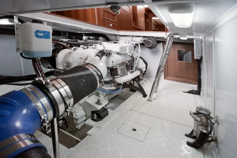 Slide: The Image of Engine room of 2025 Helmsman Trawlers 38 Sedan, showcasing modern marine equipment and design. - 26