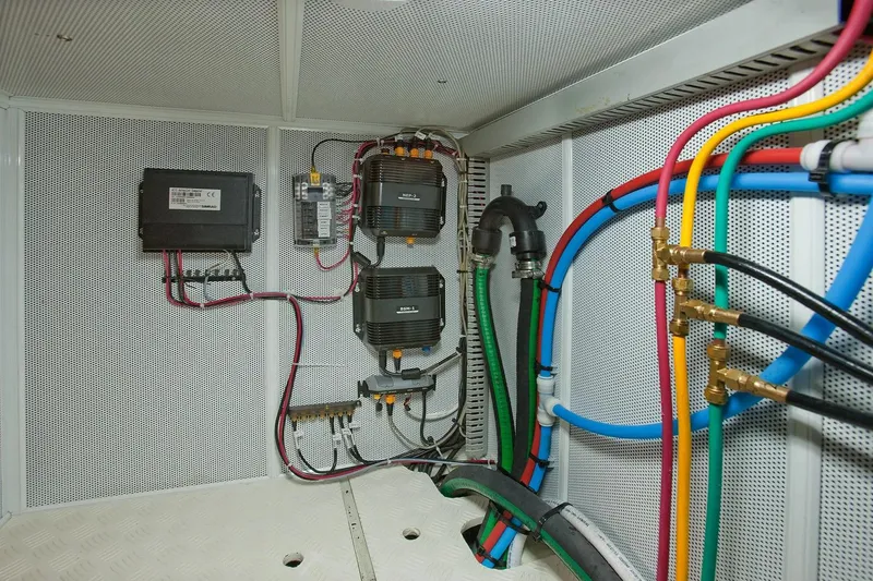 Slide: The Image of Electrical wiring and components inside a 2025 Helmsman Trawlers 38 Sedan boat. - 29