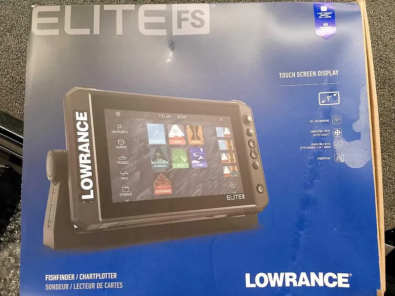 Slide: The Image of Lowrance Elite FS fishfinder with touchscreen display, featured on Ranger Z520 SC 2025 model. - 16