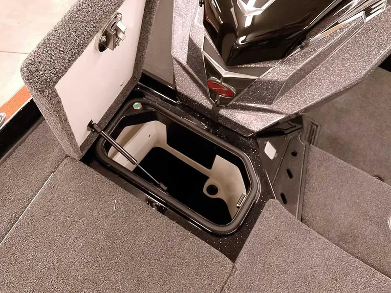 Slide: The Image of 2025 Ranger Z520 SC boat storage compartment with open lid, showcasing interior space. - 17