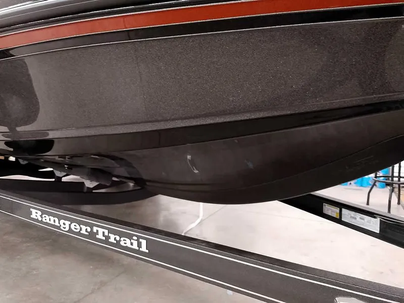 Slide: The Image of 2025 Ranger Z520 SC boat on Ranger Trail trailer, close-up view. - 6