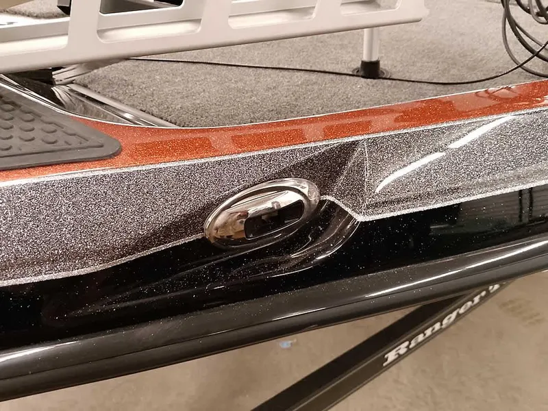 Slide: The Image of 2025 Ranger Z520 SC boat detail with metallic finish and sleek design. - 8