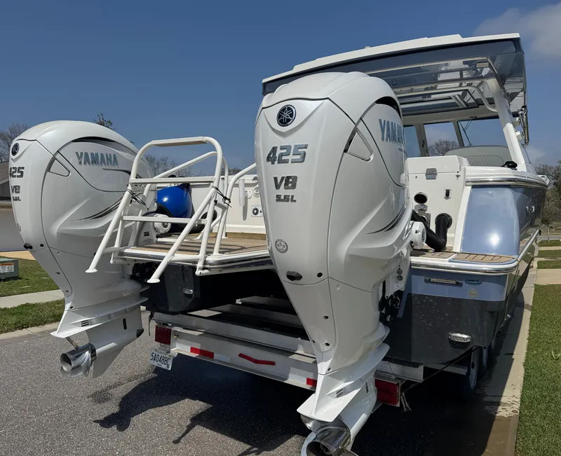 Slide: The Image of 2022 World Cat 400 DC-X boat with twin Yamaha 425 V8 engines on a trailer. - 11