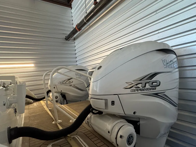Slide: The Image of 2022 World Cat 400 DC-X boat with twin XTO Offshore engines in storage. - 25