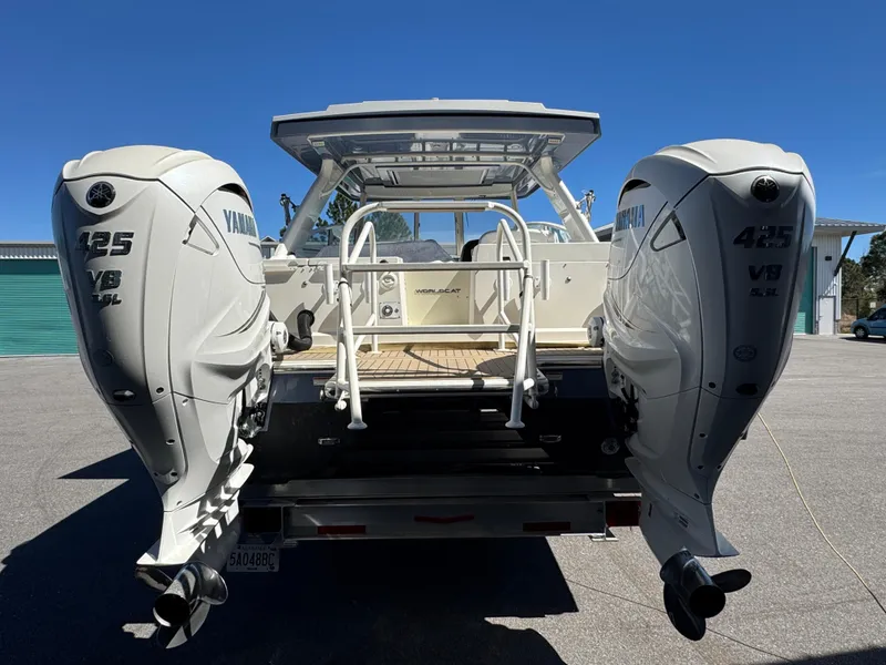 Slide: The Image of 2022 World Cat 400 DC-X boat with dual Yamaha 425 engines, rear view. - 9