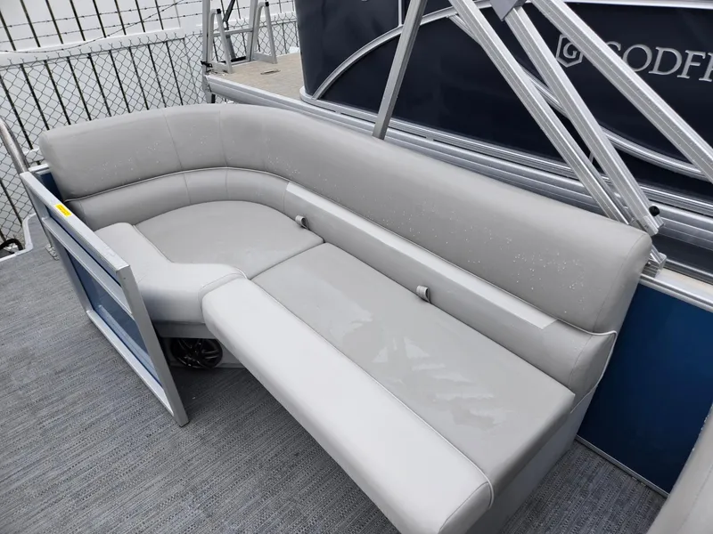 Slide: The Image of 2025 Godfrey Xperience 2286 SBX pontoon boat with gray seating and modern design. - 15