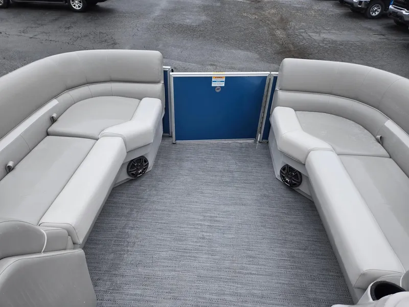 Slide: The Image of 2025 Godfrey Xperience 2286 SBX pontoon boat interior with gray seating and carpet. - 26
