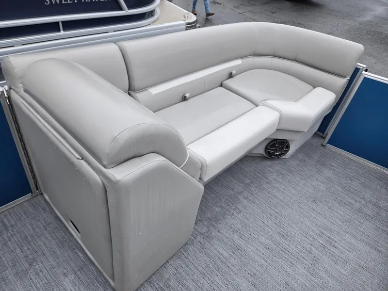 Slide: The Image of 2025 Godfrey Xperience 2286 SBX pontoon boat with gray seating and carpeted deck. - 28